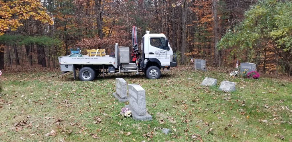 Cemetery headstone setting truck Nicholson