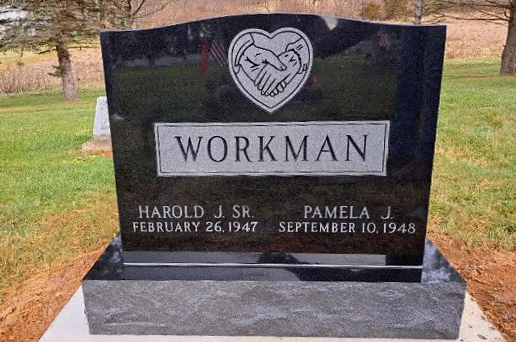 Upright Monument Black Granite Holding Hands Engraved Monument